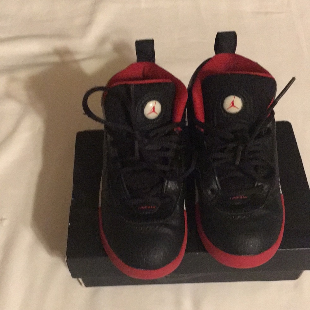 Red and black kids Nikes Jumpman size 9C